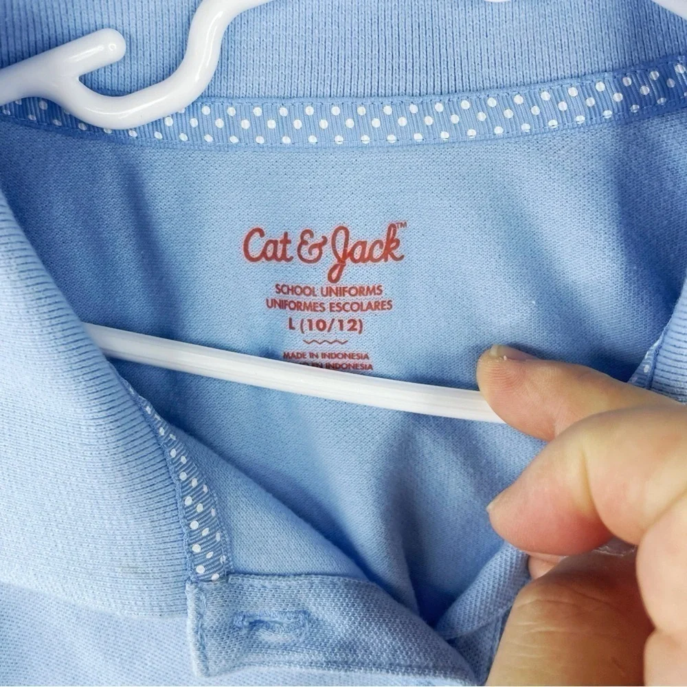CAT & JACK Girls Kids Preppy Baby Blue Polo T shirt Size says Large (10/12)